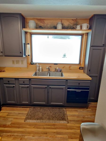 Kitchen with hillside window