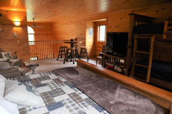 King bed and bunks in the loft