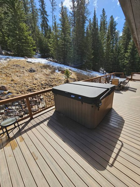 Covered hot tub on the deck